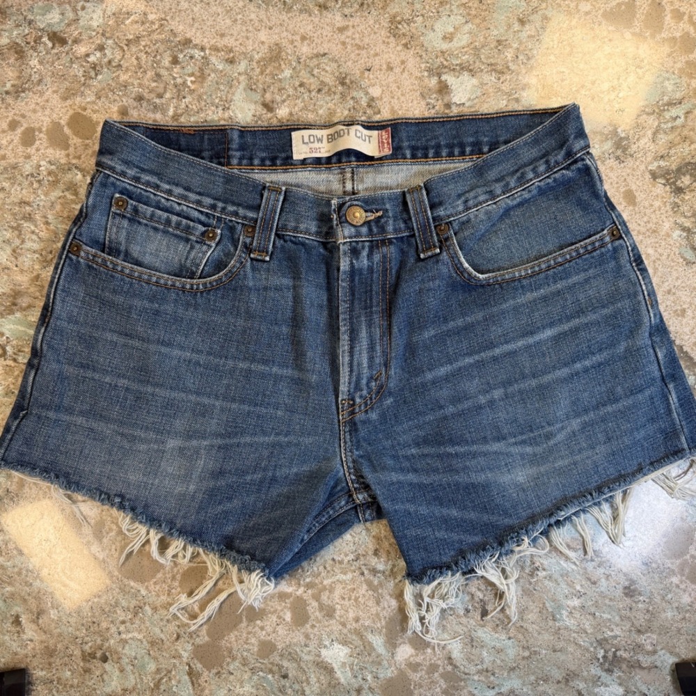 Levis 527 Low Boot Cut Cutoff Denim Shorts Women 32 Medium Wash Blue Raw Hem‎